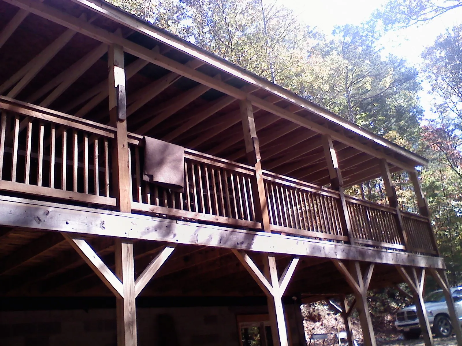 Timber framing under a new elevated porch and deck — Roof Leak Repair in Brookfield by Roofing Brothers